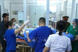 Victims are rushed to hospital for emergency aid.(Photo: VNA)
