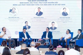 Delegates share their insights at the seminar titled "Verification and Traceability – A Driver for Vietnam’s Sustainable Digital Economy". (Photo: VNA)
