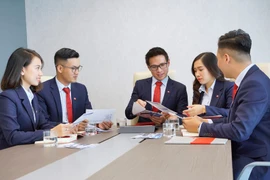 The market upgarde is a milestone recognising reform efforts over the past decade, while opening the door to a larger, more professional "playing field" which requires higher financial capacity and management standards. (Photo: VietnamPlus)