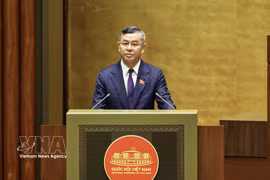 Minister of Finance Ngo Van Tuan presents the draft Law amending and supplementing several articles of the Law on Customs at the 16th National Assembly's first extraordinary session in Hanoi on August 3. (Photo: VNA)
