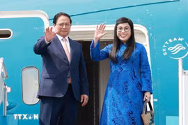 Prime Minister Pham Minh Chinh, his spouse Le Thi Bich Tran leave Hanoi on July 4 afternoon for Brazil to attend the expanded BRICS summit. (Photo: VNA)