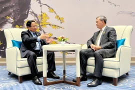 Prime Minister Pham Minh Chinh (L) meets with Cambodian Prime Minister Hun Manet on the sidelines of the SCO Summit 2025 in Tianjin, China, on September 1. (Photo: VNA)