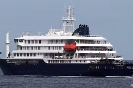 The MV Hondius cruise ship departs the port in Praia, Cape Verde on May 6. (Photo: AP)