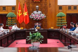PM Pham Minh Chinh chairs the meeting with permanent Government members and representatives from ministries and agencies on September 12. (Photo: VNA)