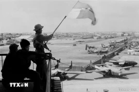 The flag of the Liberation Army flies at Tan Son Nhat Airport on April 30, 1975. (Photo: VNA)