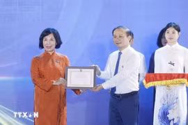 The VNA wins an A prize for its eye-catching exhibition booth. (Photo: VNA)