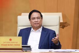 Prime Minister Pham Minh Chinh addresses the Government’s law-making session in Hanoi on July 23. (Photo: VNA)
