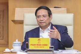 Prime Minister Pham Minh Chinh addresses the meeting. (Photo: VNA)