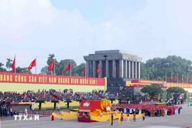 The Vietnam Fatherland Front delegation marches past the grandstand at the National Day celebration ceremony. (Photo: VNA)