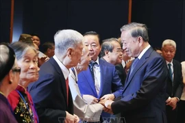 Party General Secretary To Lam meets with ex-revolutionaries and history witnesses at the gathering in Hanoi on July 24. (Photo: VNA)