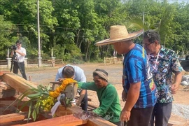 Construction has begun on a stilt house at a memorial site dedicated to President Ho Chi Minh in Udon Thani province, northeastern Thailand. (Photo: VNA)