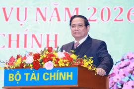 Prime Minister Pham Minh Chinh speaks at a conference reviewing the finance sector’s financial, budgetary, investment and socio-economic development efforts in 2025 and outlining tasks for 2026 held in Hanoi on January 6. (Photo: VNA)