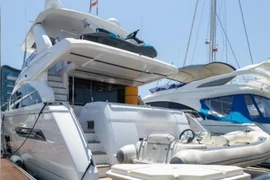 The assets tied to the Cambodia scam syndicate include a yacht, 11 cars and multiple bottles of liquor. (Photo: Singapore Police Force)