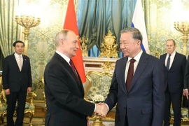 General Secretary of the Communist Party of Vietnam (CPV) Central Committee To Lam (R) and Russian President Vladimir Putin at the Kremlin Palace in Moscow on May 10 (local time). (Photo: VNA)