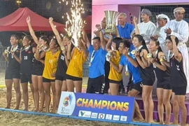 Vietnam team celebrate their Asian Women's Beach Handball Championship title on May 15 in Mucat, Oman. (Photo of VHF)