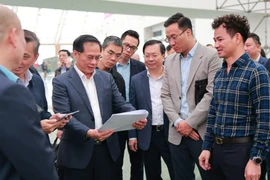 Deputy Prime Minister Bui Thanh Son inspects progress in preparations for the upcoming first Glorious Spring Fair 2026 in Hanoi. (Photo: VNA)