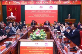 Assoc. Prof. Dr. Doan Minh Huan, member of the Party Central Committee and Permanent Vice President of the Ho Chi Minh National Academy of Politics, has a working session in Hanoi on July 21 with Chan Chun Sing, Assistant Secretary-General of the People’s Action Party (PAP) of Singapore, (Photo: VNA)