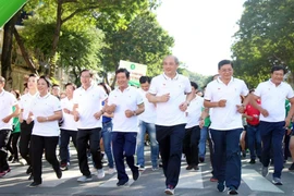 People join the Olympic Run Day 2020 in Ho Chi Minh City (Photo: VNA)