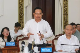 Chairman of the People's Committee of HCM City Nguyen Van Duoc speaks at the meeting. (Photo: VNA)