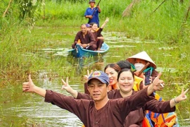 Tourists visit an eco-tourism site in the U Minh Ha forest in Ca Mau province (Photo: VNA)