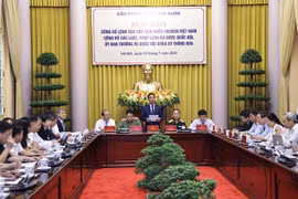 Deputy head of the Presidential Office Pham Thanh Ha (centre) speaks at the press conference on July 3. (Photo: VNA)