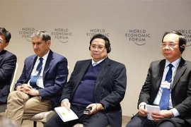 PM Pham Minh Chinh (second from right) at the seminar (Photo: VNA)