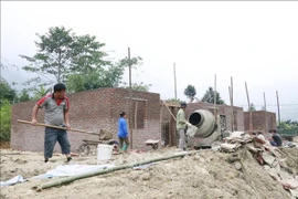 Across Lao Cai, disasters in 2025 damaged 1,178 houses. As of December 26, all 83 collapsed homes have received support, with most already rebuilt. (Photo: VNA)