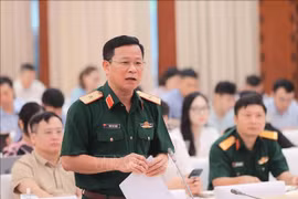 Major General Tong Van Thanh, Deputy Director of the Department of Information and Training under the General Department of Politics of the Vietnam People's Army addresses at the press conference. (Photo: VNA)