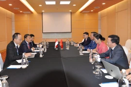 The meeting between Chairman of the Vietnamese National Assembly’s Committee for Economic and Financial Affairs Phan Van Mai (third, right) and Mardani Ali Sera, head of the Indonesian delegation and Chair of the House of Representatives' Inter-Parliamentary Cooperation Body (BKSAP) takes place on the sidelines of the 46th General Assembly of the ASEAN Inter-Parliamentary Assembly (AIPA-46) in Kuala Lumpur, Malaysia. (Photo: daibieunhandan.vn)