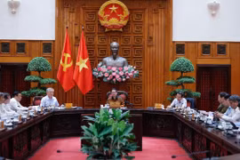 Prime Minister Pham Minh Chinh chairs the meeting of the steering committee on building regional and international financial centres. (Photo: VNA)