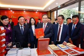 NA Chairman Tran Thanh Man (centre) at the book launch in Hanoi on February 24. (Photo: VNA)