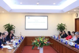 At the talks between delegations from the Vietnam News Agency and Russian news agency TASS in Hanoi on February 24. (Photo: VNA)