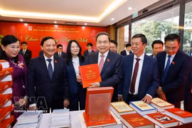NA Chairman Tran Thanh Man (centre) at the book launch in Hanoi on February 24. (Photo: VNA)