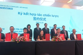 At the signing ceremony between NSSC and CCPIT (Photo: VNA)