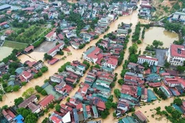 More than 5,000 households in Yen Bai ward, Lao Cai province, are affected by flood. (Photo: VNA)