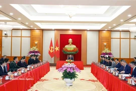 Party General Secretary To Lam hosts a reception for China's Minister of Foreign Affairs Wang Yi, Minister of National Defence Dong Jun, and Minister of Public Security Wang Xiaohong in Hanoi on March 16. (Photo: VNA)