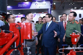 PM Pham Minh Chinh visits the Secutech+ Vietnam exhibition. (Photo: VNA)