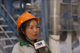 Thiphakesone Saysangoan, a worker at Sepon Tapioca Starch Processing Sole Co., Ltd. – a Vietnamese-invested company, in an interview with the Vietnam News Agency's correspondents in Laos. (Photo: VNA)