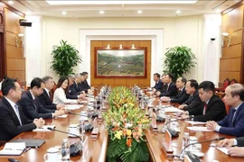 At the talks between Trinh Van Quyet, Secretary of the Communist Party of Vietnam (CPV) Central Committee and head of the CPV Central Committee’s Commission for Information, Education, and Mass Mobilisation, and Li Shulei, Politburo member, Secretary of the Communist Party of China (CPC) Central Committee’s Secretariat, and head of the CPC Central Committee’s Publicity Department in Hanoi on November 13 (Photo: VNA)