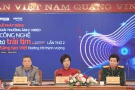 The “Technology with heart” organising committee answers reporters’ questions at the launch of the photo and video award in February. (Photo: VNA)