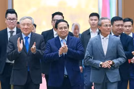 Prime Minister Pham Minh Chinh (middel, front) arriving at the conference (Photo: VNA)