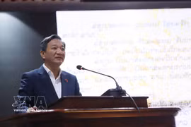 Vietnamese Ambassador to Laos Nguyen Minh Tam speaks at the event. (Photo: VNA)