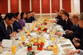 At the working breakfast (Photo: VNA)