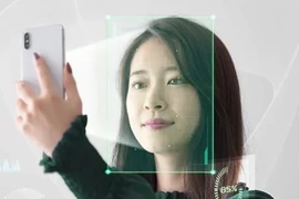 From January 5 next year, customers will be required to conduct biometric authentication when opening a bank card (Photo: VNA)