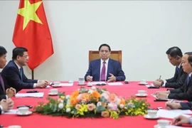 Vietnamese Prime Minister Pham Minh Chinh holds phone talks with his Cambodian counterpart Hun Manet on August 15 afternoon. (Photo: VNA)