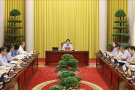 State President Luong Cuong holds a working session with the Presidential Office on August 27 to review tasks for August and outline priorities for September. (Photo: VNA)