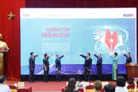 Officials launch the portal of the awards' 11th edition on June 12, 2025. (Photo: VNA)