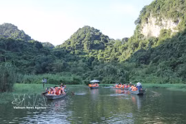 Tourists visit Thung Nham Bird Park in Nam Hoa Lu ward, Ninh Binh province. (Photo: VNA)