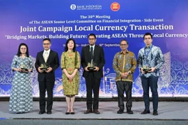 BI Deputy Governor Filianingsih Hendarta (third from left) at the Joint ASEAN LCT Campaign in Yogyakarta, September 18, 2025. (Photo: Antara)