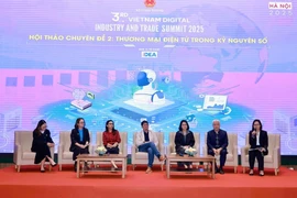 Speakers at the thematic session titled “E-commerce in the Digital Era”, held in Hanoi on December 3 as part of the Vietnam Digital Industrial and Trade Summit 2025. (Photo: VNA)
